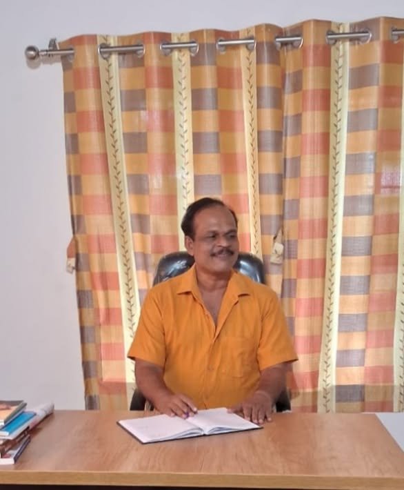Pradheep N.V. consulting clients at his psychological guidance desk in Pattambi